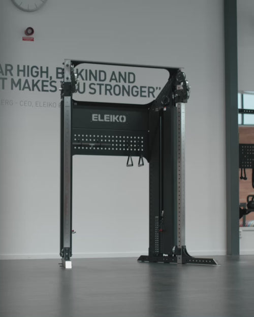 ELEIKO デュアル アジャスタブル プーリーの両手式高さ調整機構とケーブルエクササイズの使用例